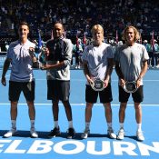 Max Purcell (far right) and Luke Saville (next to Purcell) pose with their Australian Open men's doubles finalists trophies (photo: Getty Images)
