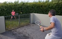 PLAYING AT HOME: A backyard can become a tennis court. Picture: David Dickson Photography