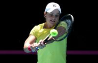 SMILES ALL ROUND: Ash Barty on the practice court. Picture: Getty Images