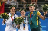 HONOUR: Amelie Mauresmo of France, Justine Henin of Belgium and Australia's Alicia Molik receive their medals at the 2004 Olympic Games in Athens. Picture: Getty Images
