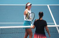 HAPPY TO BE BACK: Olivia Gadecki and Sara Tomic tap racquets after their UTR Pro Tennis Series match in Brisbane.