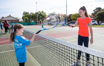 FUN ON COURT: South Australian players are embracing physical distancing measures to keep playing tennis. 