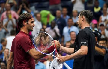 MILESTONE WIN: John Millman, right, defeated Roger Federer in the US Open fourth round in 2018. Picture: Getty Images