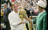 Rod Laver accepts the winner's trophy from Queen Elizabeth at 1968 Wimbledon; Getty Images