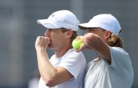 Luke Saville and Max Purcell talk tactics at the US Open earlier this month. Picture: Getty Images