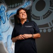 Evonne Goolagong Cawley stands in front of a mural of her painted by a group of local artists, including David Collins and Indigenous artists Shaun Lee ‘Hafleg’ and Jesse Bell to celebrate and recognise her incredible achievements during the National Indigenous Tennis Carnival at the Darwin International Tennis Centre. 