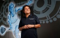 Evonne Goolagong Cawley stands in front of a mural of her painted by a group of local artists, including David Collins and Indigenous artists Shaun Lee ‘Hafleg’ and Jesse Bell to celebrate and recognise her incredible achievements during the National Indigenous Tennis Carnival at the Darwin International Tennis Centre.