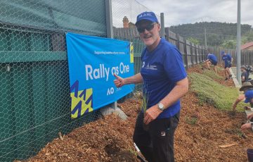 HELPING HAND: Former world No.1 doubles star John Fitzgerald at a Rally as One event in Cobargo this week. Picture: Tennis Australia