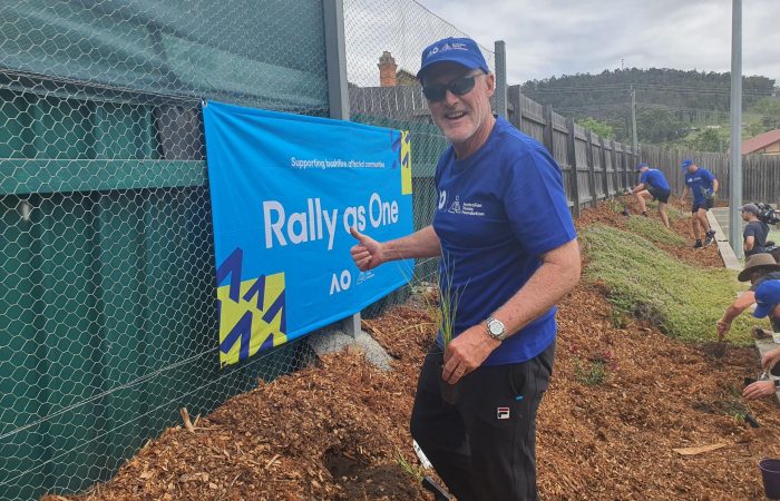 HELPING HAND: Former world No.1 doubles star John Fitzgerald at a Rally as One event in Cobargo this week. Picture: Tennis Australia