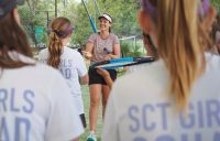 DELIVERED WITH A SMILE: Emily Burns is enjoying inspiring the next generation as a coach.