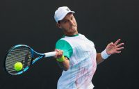 POWERING ON: James Duckworth hits a forehand during his first-round win at Australian Open 2021. Picture: Tennis Australia