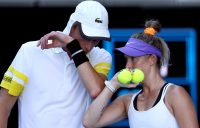 Marc Polmans and Storm Sanders talk tactics during a mixed doubles match at Australian Open 2021. Picture: Tennis Australia