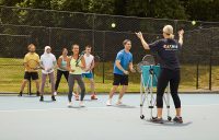 Participants enjoy a Cardio Tennis session.