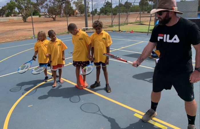 Jarron Kretschmann delivers tennis programs to children in remote Australian communities. 