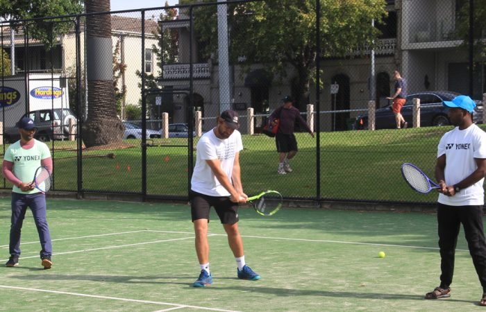 Australian players and coaches welcomed a group of refugees to Victorian Tennis Academy, Fawkner Park Tennis Centre; photo courtesy Maggie Garcia Pena