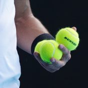 Fabio Fognini (ITA) selects which ball to use against Raphael NADAL (ESP) during his match on Rod Laver Arena day 8 of the Australian Open at Melbourne Park on Monday, February 15, 2021. MANDATORY PHOTO CREDIT Tennis Australia/ Michael Dodge