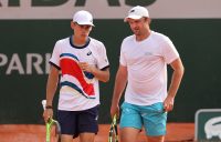 AUSSIE TEAM: Alex de Minaur and Matt Reid during their first-round win at Roland Garros. Picture: Getty Images