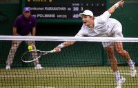Australia's Marc Polmans stretches for a volley during Wimbledon qualifying action. Picture: AELTC
