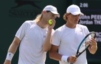 Luke Saville and Max Purcell talk tactics on court at Wimbledon. Picture: Getty Images