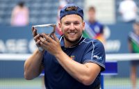 Dylan Alcott of Australia celebrates with the US Open trophy; Getty Images