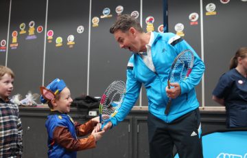 Todd Woodbridge presents a racquet as part of the ANZ Tennis Hot Shots Racquet Roadshow. Picture: Tennis Australia