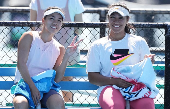 Lizette Cabrera and Destanee Aiava take a break during a training session at Melbourne Park. Picture: Tennis Australia