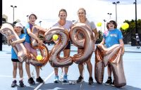 Charlotte Connolly, Ava Tobias, Sam Stosur, Ellen Perez and Braith Tobias celebrate the huge Australian participation numbers. Picture: Tennis Australia