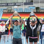 Pedro RODRIGUEZ (AUS) and Tina BIANCHI (AUS) pose with the trophies during the Glam Slam, Australia's biggest LGBTQI tennis tournament on Court 3 on Day 14 of the Australian Open at Melbourne Park on Sunday, February 21, 2021. MANDATORY PHOTO CREDIT Tennis Australia/ LUKE HEMER
