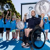 Dylan Alcott and members of the AO 2022 Coin Crew launch the AO 2022 coin honouring Margaret Molesworth. 