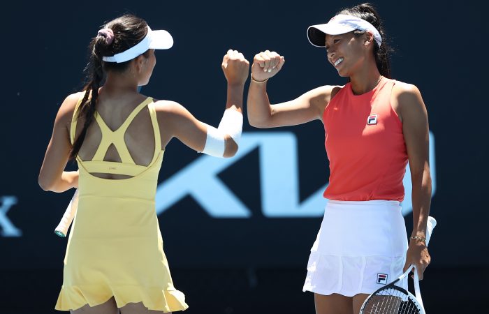 Aussie wildcards Lizette Cabrera and Priscilla Hon celebrate their first-round win at AO 2022. Picture: Getty Images