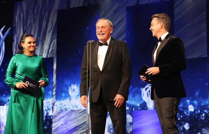 Casey Dellacqua, John Newcombe and Todd Woodbridge during the 2022 Australian Tennis Awards. Picture: Tennis Australia