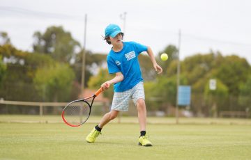 Grass-court action in country Victoria. Picture: Tennis Australia