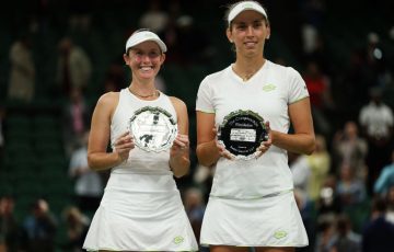 Storm Hunter and Belgium's Elise Mertens with their runners-up trophies at Wimbledon. Picture: Getty Images