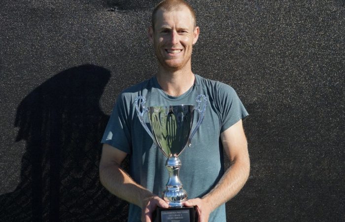 Luke Saville with his Caloundra International title. Picture: Tennis Queensland