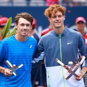 Jannik Sinner (R) and Alex de Minaur pose with their trophies after the ATP Masters 1000 final in Toronto, Canada. (Getty Images)