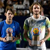 Stefanos Tsitsipas (R) and Alex de Minaur (L) hold their trophies after the ATP Los Cabos final. (Getty Images)