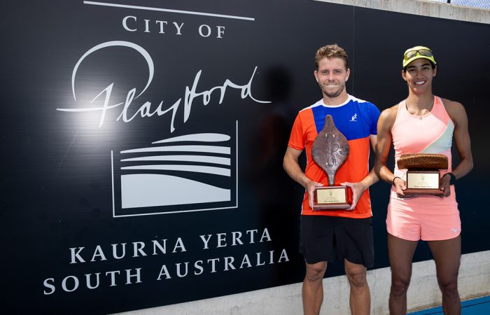 James Duckworth and Astra Sharma celebrate winning singles titles at the 2023 City of Playford Tennis International. 