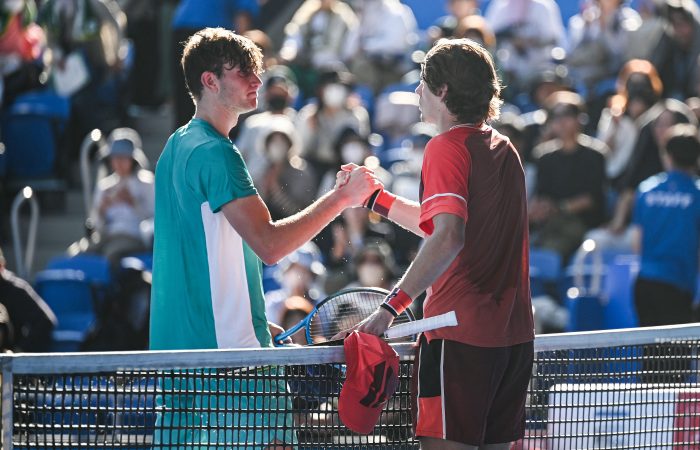 Alex de Minaur and Jack Draper shake hands after the first round at the Japan Open. Getty Images