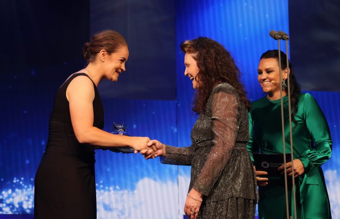 Ash Barty presents the Volunteer Achievement Award to Julie Polkinghorne at the 2022 Australian Tennis Awards. Picture: Tennis Australia