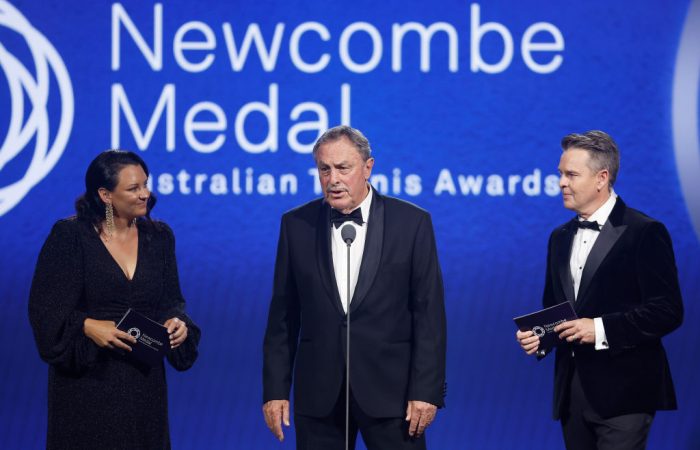 Casey Dellacqua, John Newcombe and Todd Woodbridge on stage at the 2023 Australian Tennis Awards. Picture: Getty Images