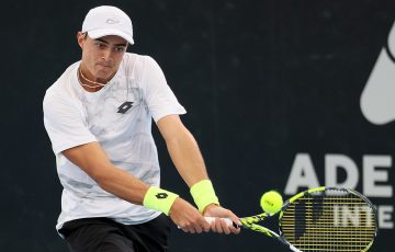 January 7: Adam Walton (AUS) hits a backhand against Pedro Cachin (ARG) on the Show Court during the 2024 Adelaide International, on Sunday, January 7, 2024. Photo by TENNIS AUSTRALIA/ James Elsby