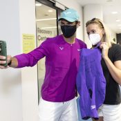 Rafael Nadal takes a selfie with Ariarne Titmus after they exchanged competitive outfits at Australian Open 2022. Picture: Tennis Australia