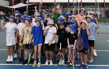 The Today Show weatherman Tim Davies with juniors from the Redland Bay Tennis Club. 