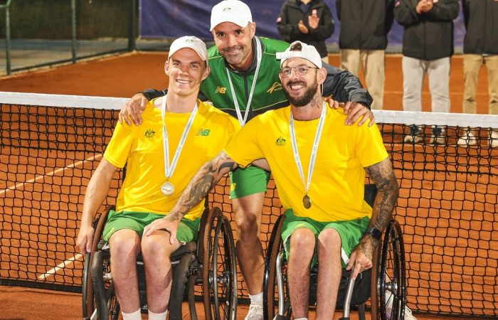 Finn Broadbent and Heath Davidson celebrate with captain Francois Vogelsberger. Picture: ITF