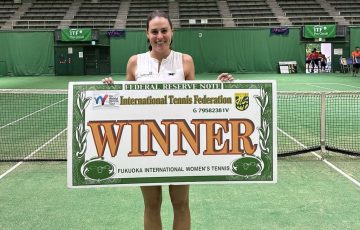 Kimberly Birrell celebrates winning an ITF 75 title in Japan.