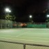 two plexipave tennis courts at night